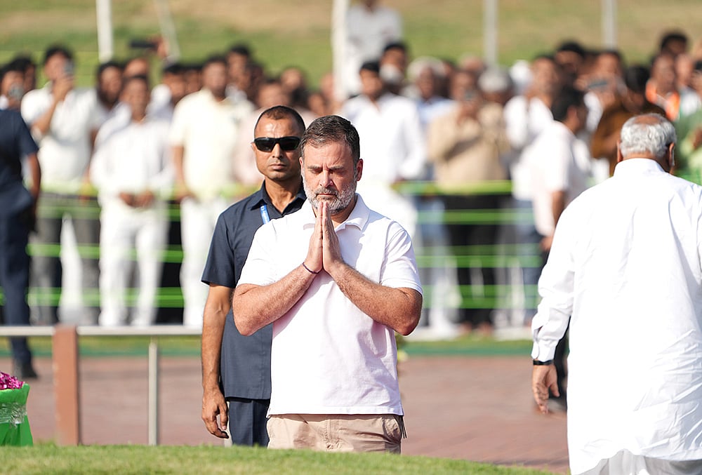 Congress MP and Leader of Opposition in Lok Sabha Rahul Gandhi pays tribute to India's first Prime Minister Jawaharlal Nehru on his 62nd death anniversary at Shanti Van, in New Delhi. - | Photo: AP/Kamal Kishore