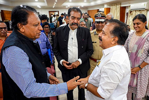 Kerala Home Minister Ramesh Chennithala in conversation with former Ambassador TP Sreenivasan during an event, in Thiruvananthapuram. Retired IPS officer Rishi Raj Singh and DGP and State Police Chief Ravada A Chandrasekhar are also present. 