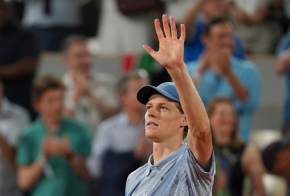 Jannik Sinner of Italy celebrates after winning the first round men's singles tennis match against Clement Tabur of France at the French Open tennis tournament in Paris. - | Photo: AP/Thibault Camus