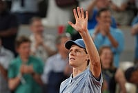 | Photo: AP/Thibault Camus : Jannik Sinner of Italy celebrates after winning the first round men's singles tennis match against Clement Tabur of France at the French Open tennis tournament in Paris.