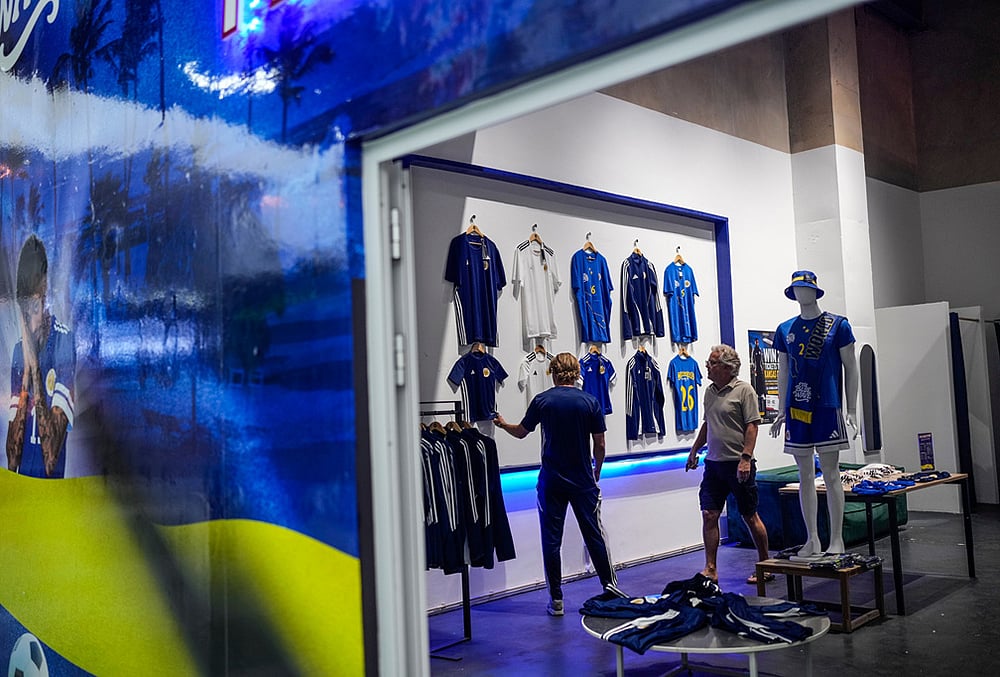 Curacao national soccer team jerseys hang for sale at a store in Willemstad, Curacao. - | Photo: AP/Matias Delacroix