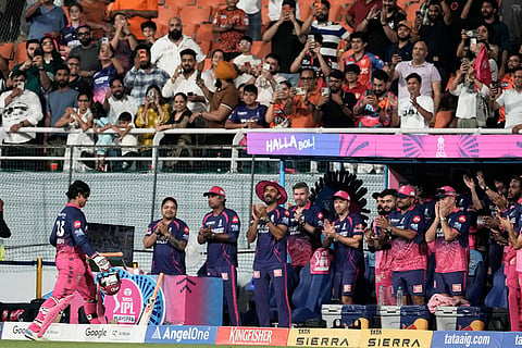 Rajasthan Royals' Vaibhav Sooryavanshi gets an applause from the dug out as he leaves the ground after losing his wicket during the Indian Premier League cricket match between Rajasthan Royals and Sunrisers Hyderabad in New Chandigarh, India.