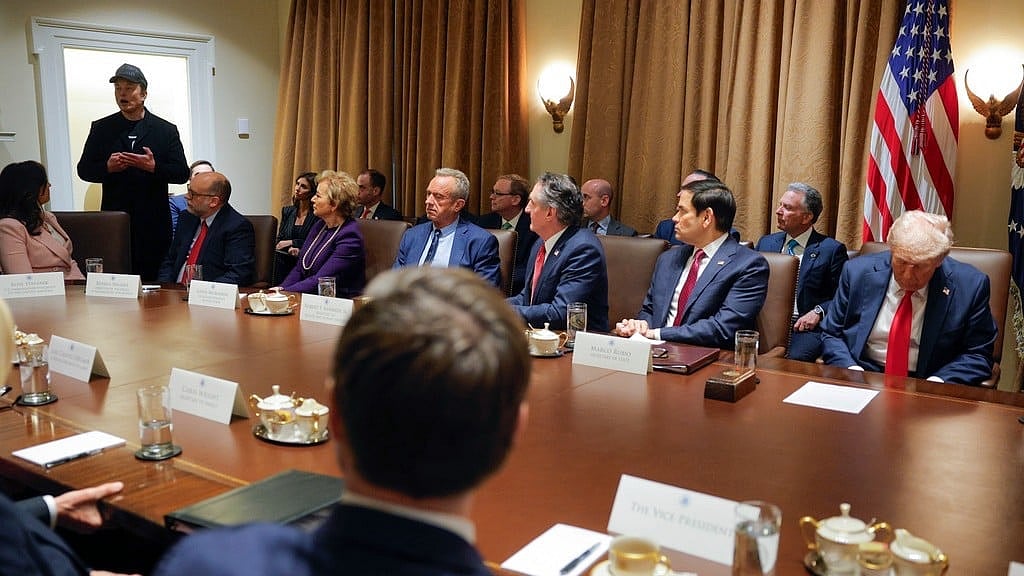 Elon Musk speaks as President Donald Trump holds a Cabinet meeting at the White House in Washington, Tuesday, Feb. 26, 2025. - AP