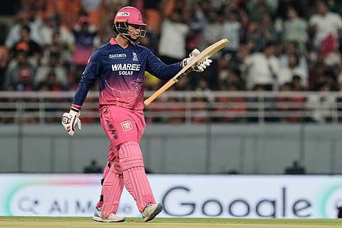 Rajasthan Royals' Vaibhav Sooryavanshi celebrates his fifty runs during the Indian Premier League cricket match between Rajasthan Royals and Sunrisers Hyderabad in New Chandigarh, India.