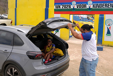 A boy leaves soccer practice in Willemstad, Curacao.