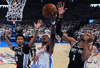 San Antonio Spurs Vs Oklahoma City Thunder, NBA Playoffs: SGA-Powered OKC Win Crucial Game 5, Move Closer To Finals | Photo: AP/Julio Cortez : Oklahoma City Thunder guard Shai Gilgeous-Alexander (2) shoots against San Antonio Spurs forward Victor Wembanyama (1) in the second half of Game 5 in the Western Conference finals NBA basketball playoffs series in Oklahoma City.