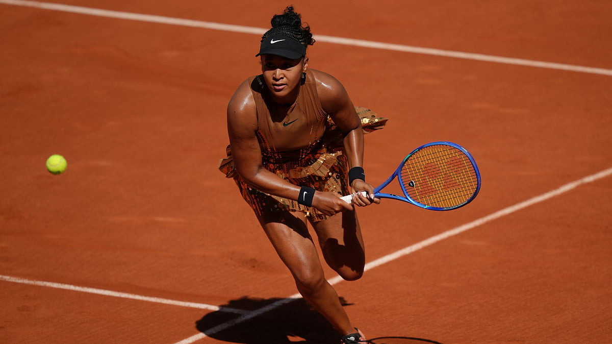 Naomi Osaka of Japan returns to Laura Siegemund of Germany during their first round women's singles tennis match at the French Open tennis tournament in Paris, Tuesday, May 26, 2026. - (AP Photo/Aurelien Morissard)