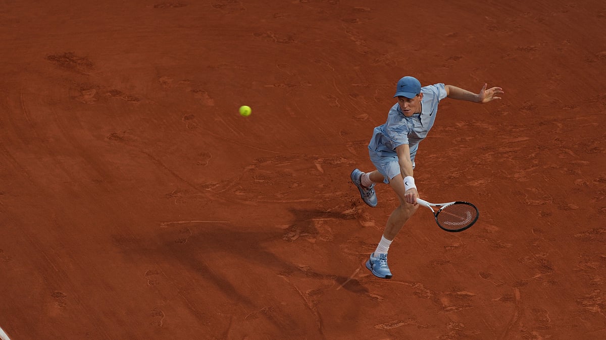 Jannik Sinner of Italy returns to Clement Tabur of France during their first round men's singles tennis match at the French Open tennis tournament in Paris, Tuesday, May 26, 2026. - (AP Photo/Thibault Camus)