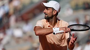 | Photo: AP/Thibault Camus : Novak Djokovic of Serbia reacts as he plays against Valentin Royer of France during their second round men's singles tennis match at the French Open tennis tournament in Paris.