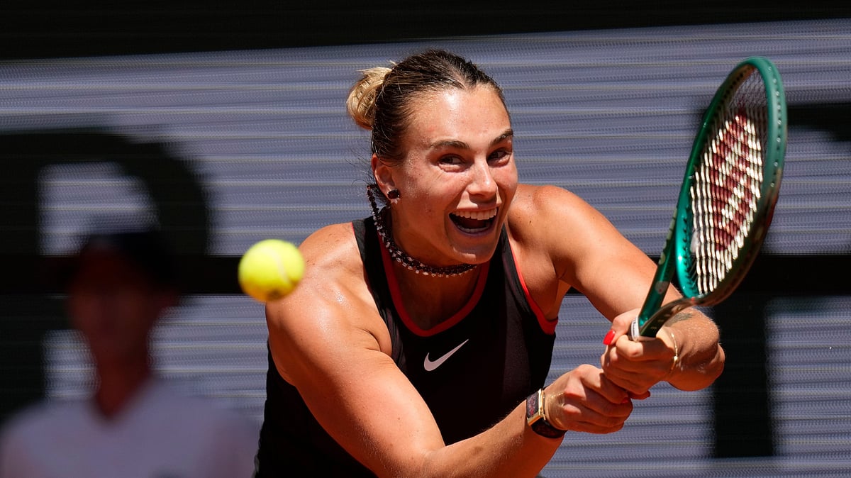 Aryna Sabalenka of Belarus returns to Jessica Bouzas Maneiro of Spain during their first round women's singles tennis match at the French Open tennis tournament in Paris, Tuesday, May 26, 2026. - (AP Photo/Christophe Ena)