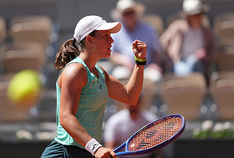 Kaitlin Quevedo of Spain reacts as she plays against Elina Svitolina of Ukraine during their second round women's singles tennis match at the French Open tennis tournament in Paris.