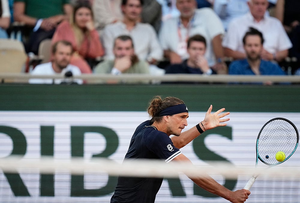 Alexander Zverev of Germany returns to Tomas Machac of the Czech Republic during their second round mens singles tennis match at the French Open tennis tournament in Paris.
