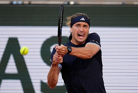 Alexander Zverev of Germany returns to Tomas Machac of the Czech Republic during their second round men's singles tennis match at the French Open tennis tournament in Paris.