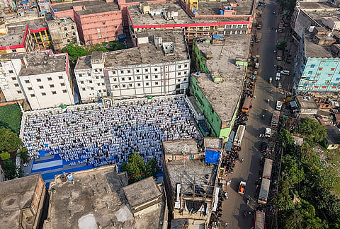 People offer Eid al-Adha prayers at a mosque premises, in Bankra, Howrah district of West Bengal.