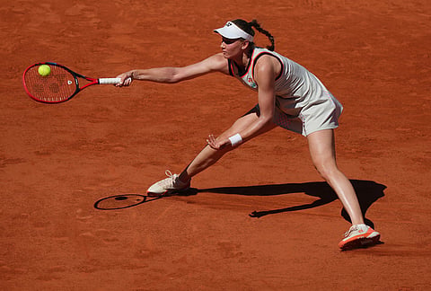 Elena Rybakina of Kazakhstan returns to Yuliia Starodubtseva of Ukraine during their second round women's singles tennis match at the French Open tennis tournament in Paris.