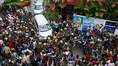 ED officials’ vehicle was attacked outside former Kerala CM Pinarayi Vijayan’s Thiruvananthapuram residence after raids linked to the CMRL pay-off case - PTI