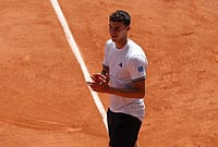 Jannik Sinner Vs Juan Cerundolo: Argentine Produces Roland-Garros Shock To Knock Out World No. 1 | Photo: AP/Aurelien Morissard : Juan Manuel Cerundolo of Argentina celebrates winning against Jannik Sinner of Italy after their second round men's singles tennis match at the French Open tennis tournament in Paris.