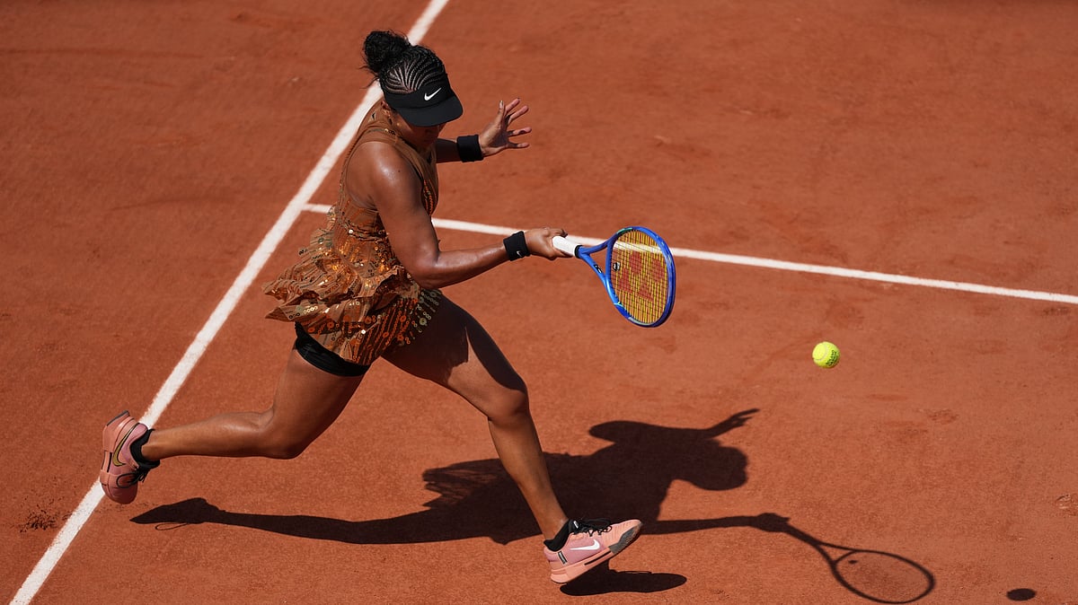 Naomi Osaka of Japan returns to Donna Vekic of Croatia during their second round women's singles tennis match at the French Open tennis tournament in Paris, Thursday, May 28, 2026. - (AP Photo/Thibault Camus)