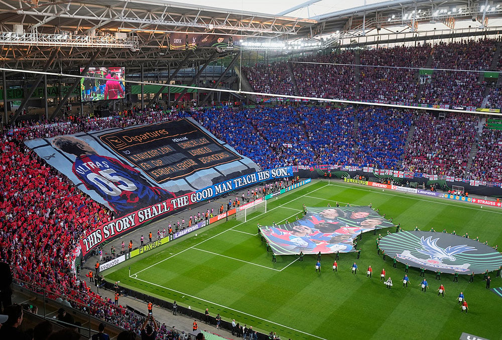 Fans of Crystal Palace display their tifo before the Europa Conference League final soccer match between Crystal Palace and Rayo Vallecano in Leipzig, Germany.