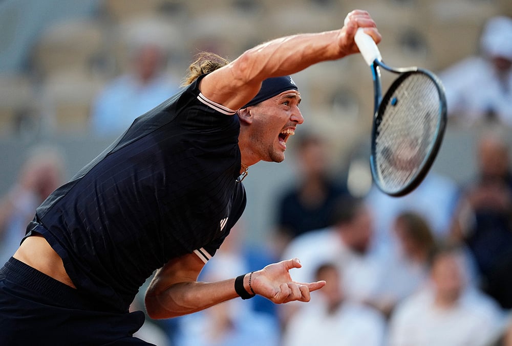 Alexander Zverev of Germany serves to Tomas Machac of the Czech Republic during their second round mens singles tennis match at the French Open tennis tournament in Paris.