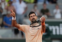 | Photo: AP/Thibault Camus : Novak Djokovic of Serbia celebrates after winning against Valentin Royer of France during their second round men's singles tennis match at the French Open tennis tournament in Paris.