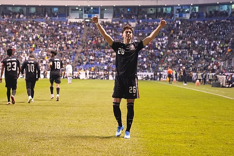 Mexico's Brian Gutiérrez celebrates scoring his side's opening goal against Ghana during an international friendly soccer match in Puebla, Mexico