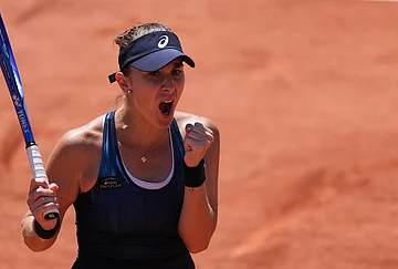 | Photo: AP/Thibault Camus : Belinda Bencic of Switzerland celebarates after winning against Caty Mcnally of the U.S. during their second round women's singles tennis match at the French Open tennis tournament in Paris.