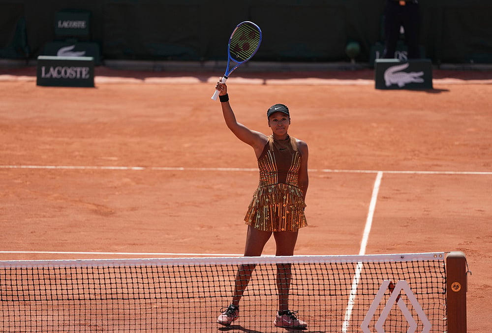 Naomi Osaka of Japan celebrates winning against Donna Vekic of Croatia during their second round women's singles tennis match at the French Open tennis tournament in Paris. - | Photo: AP/Thibault Camus