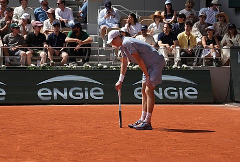 Jannik Sinner of Italy reacts at the end of the second round men's singles tennis match against Juan Manuel Cerundolo of Argentina at the French Open tennis tournament in Paris.