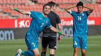 AP Photo : Iraq's Ali Najatee celebrates after scoring his side's opening goal during the international friendly soccer match between Iraq and Andorra in Girona, Spain.
