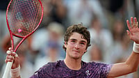 (AP Photo/Christophe Ena) : Joao Fonseca of Brazil celebrates winning the third round men's singles tennis match against Novak Djokovic of Serbia at the French Open tennis tournament in Paris, Friday, May 29, 2026. 
