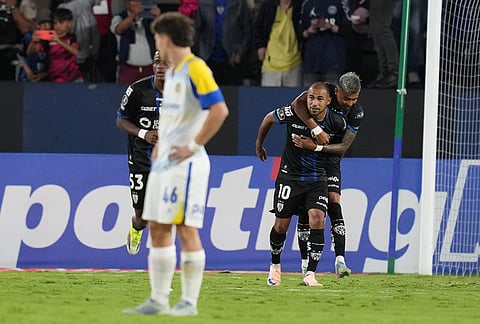 Junior Sornoza of Ecuador's Independiente del Valle, 10, celebrates after scoring his side's opening goal by penalty shot against Argentina's Rosario Central during a Copa Libertadores Group H soccer match in Quito, Ecuador.