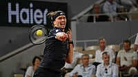 AP Photo : Alexander Zverev of Germany returns to Quentin Halys of France during their third round men's singles tennis match at the French Open tennis tournament in Paris.