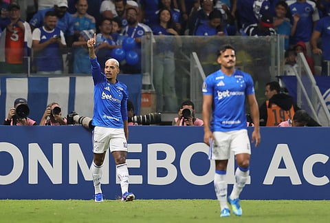 Matheus Pereira of Brazil's Cruzeiro, left, celebrates after scoring his side's opening goal against Ecuador's Barcelona during a Copa Libertadores Group D soccer match in Belo Horizonte, Brazil.