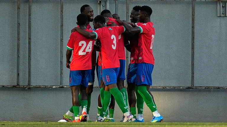 Gambia's players celebrate after teammate Omar Colley scored the opening goal during a friendly soccer match between Iran and Gambia, in Antalya, southern Turkey. - AP Photo