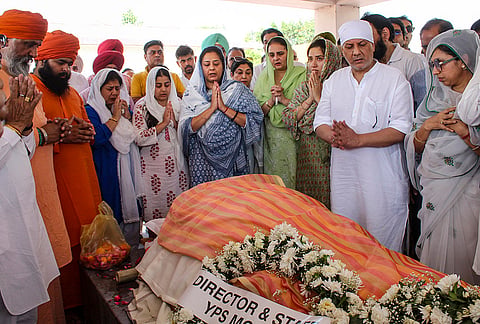 Family members of veteran Indian sports administrator Randhir Singh, during the latter’s last rites, at Chandi Ghat in Haridwar.