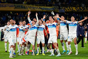 | Photo: AP/Gustavo Garello : Players of Chile's Universidad Catolica celebrate their team's 1-0 victory over Argentina's Boca Juniors at the end a Copa Libertadores Group D soccer match in Buenos Aires, Argentina.