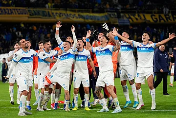 | Photo: AP/Gustavo Garello : Players of Chile's Universidad Catolica celebrate their team's 1-0 victory over Argentina's Boca Juniors at the end a Copa Libertadores Group D soccer match in Buenos Aires, Argentina.