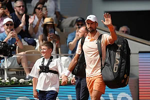 | Photo: AP/Aurelien Morissard : Novak Djokovic of Serbia enters the court for the third round men's singles tennis match against Joao Fonseca of Brazil at the French Open tennis tournament in Paris.