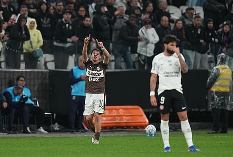 Franco Zapiola of Argentina's Platense celebrates scoring his side's second goal against Brazil's Corinthians during a Copa Libertadores Group E soccer match in Sao Paulo.