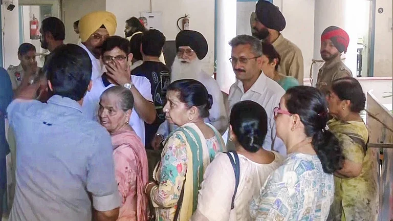 Voters arrive at polling stations to cast their votes during the Punjab municipal election - ANI