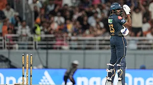 AP Photo : Gujarat Titans' Sai Sudharsan reacts after losing his wicket by dropping his bat on to his wickets during the Indian Premier League cricket match between Gujarat Titans and Rajasthan Royals in New Chandigarh.