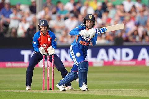India's Yastika Bhatia, right, batting during the first Vitality IT20 cricket match between England and India in Chelmsford, England.