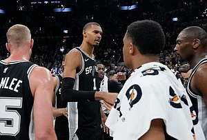| Photo: AP/David J. Phillip : San Antonio Spurs forward Victor Wembanyama (1) speaks to teammates after a win over the Oklahoma City Thunder after Game 6 in the Western Conference finals NBA basketball playoffs series, in San Antonio.
