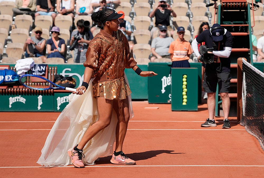 Naomi Osaka of Japan warms up before the second round womens singles tennis match against Donna Vekic of Croatia at the French Open tennis tournament in Paris.