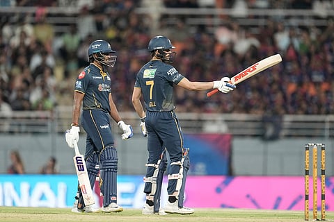 Gujarat Titans' captain Shubman Gill celebrates his fifty runs during the Indian Premier League cricket match between Gujarat Titans and Rajasthan Royals in New Chandigarh, India.