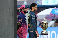 | Photo: AP/Ashwini Bhatia : Gujarat Titans' captain Shubman Gill and Rajasthan Royals' captain Riyan Parag, left, pose for a photographs with the winner's trophy at the start of the Indian Premier League cricket match between Gujarat Titans and Rajasthan Royals in New Chandigarh, India.