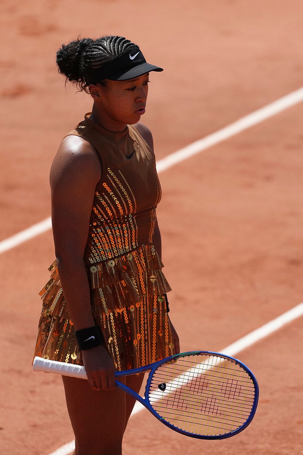Naomi Osaka of Japan reacts as she plays against Donna Vekic of Croatia during their second round womens singles tennis match at the French Open tennis tournament in Paris.