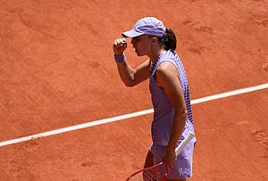 | Photo: AP/Christophe Ena : Iga Swiatek of Poland celebrates winning the third round women's singles tennis match against Magda Linette of Poland at the French Open tennis tournament in Paris.