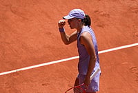 | Photo: AP/Christophe Ena : Iga Swiatek of Poland celebrates winning the third round women's singles tennis match against Magda Linette of Poland at the French Open tennis tournament in Paris.
